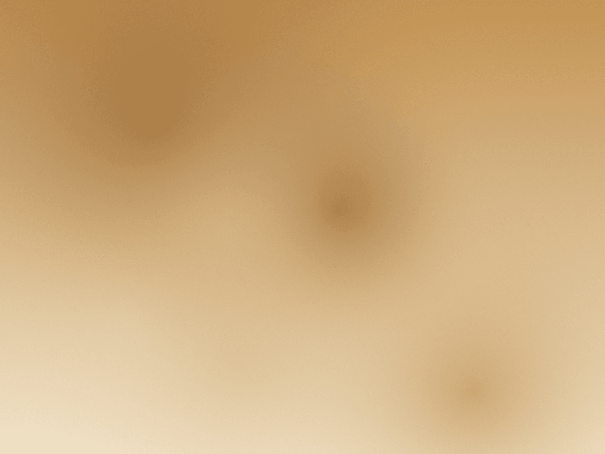A working palette covered in mixed ochres